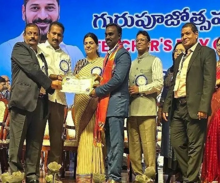 అవార్డు అందుకున్న డా. కాంపల్లి అర్జున్