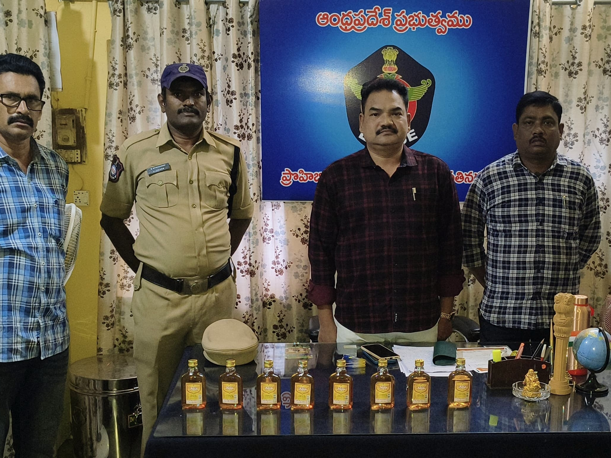 మద్యం సీసాలు స్వాధీనం.. వ్యక్తిపై కేసు నమోదు