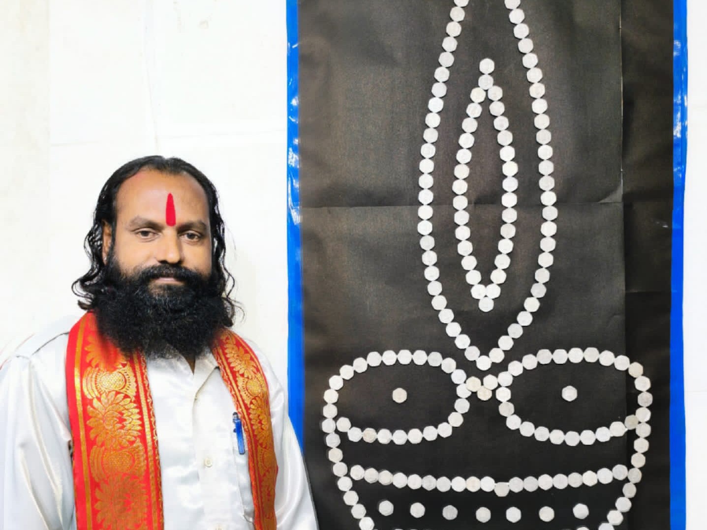 లక్ష్మీదేవి చిత్రాన్ని చిత్రించి శుభాకాంక్షలు తెలిపిన రామకోటి రామరాజు