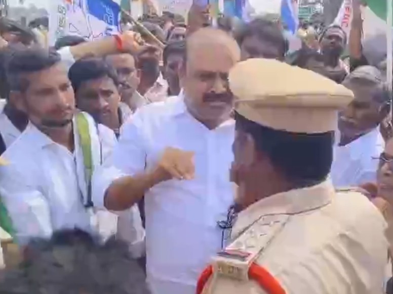 మాజీ ఎమ్మెల్యే, పోలీసుల మధ్య వాగ్వాదం