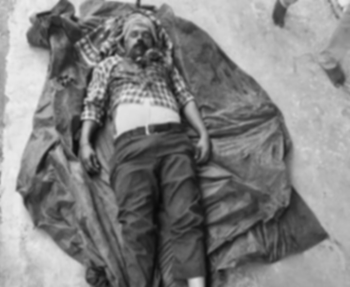 లారీపై నుంచి జారిపడి డ్రైవర్ మృతి