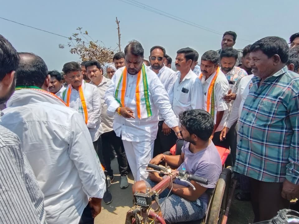 దివ్యాంగుడికి హామీ ఇచ్చిన మంత్రి అడ్లూరి